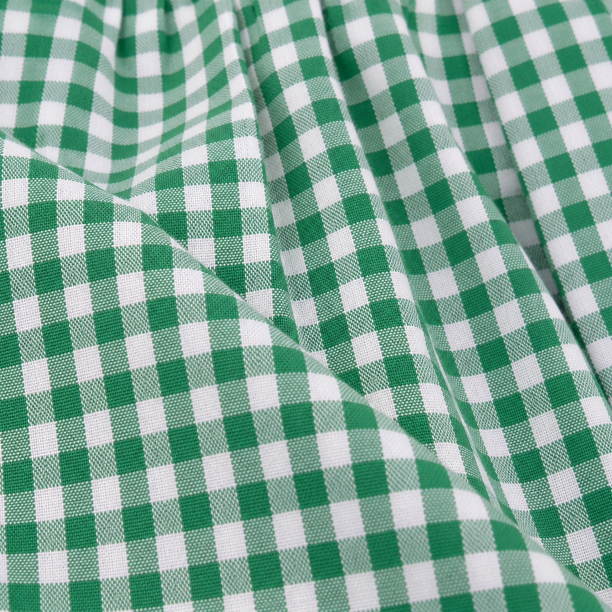 Detailaufnahme der Schürze vom Kinderdirndl Nele grün