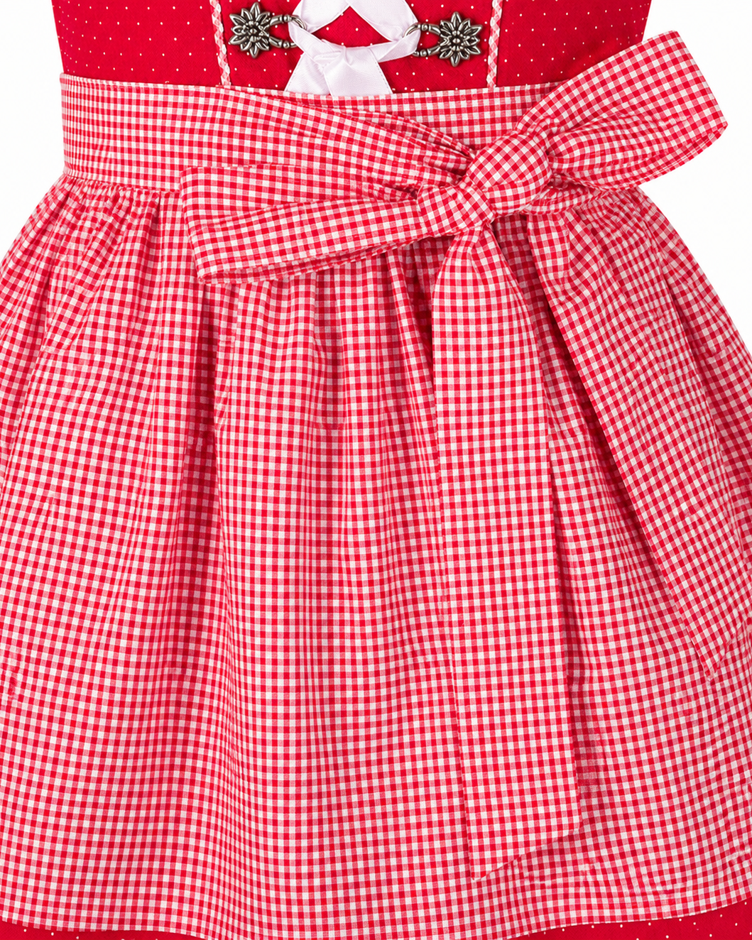 Detailaufnahme der Schürze vom Kinderdirndl Nele rot