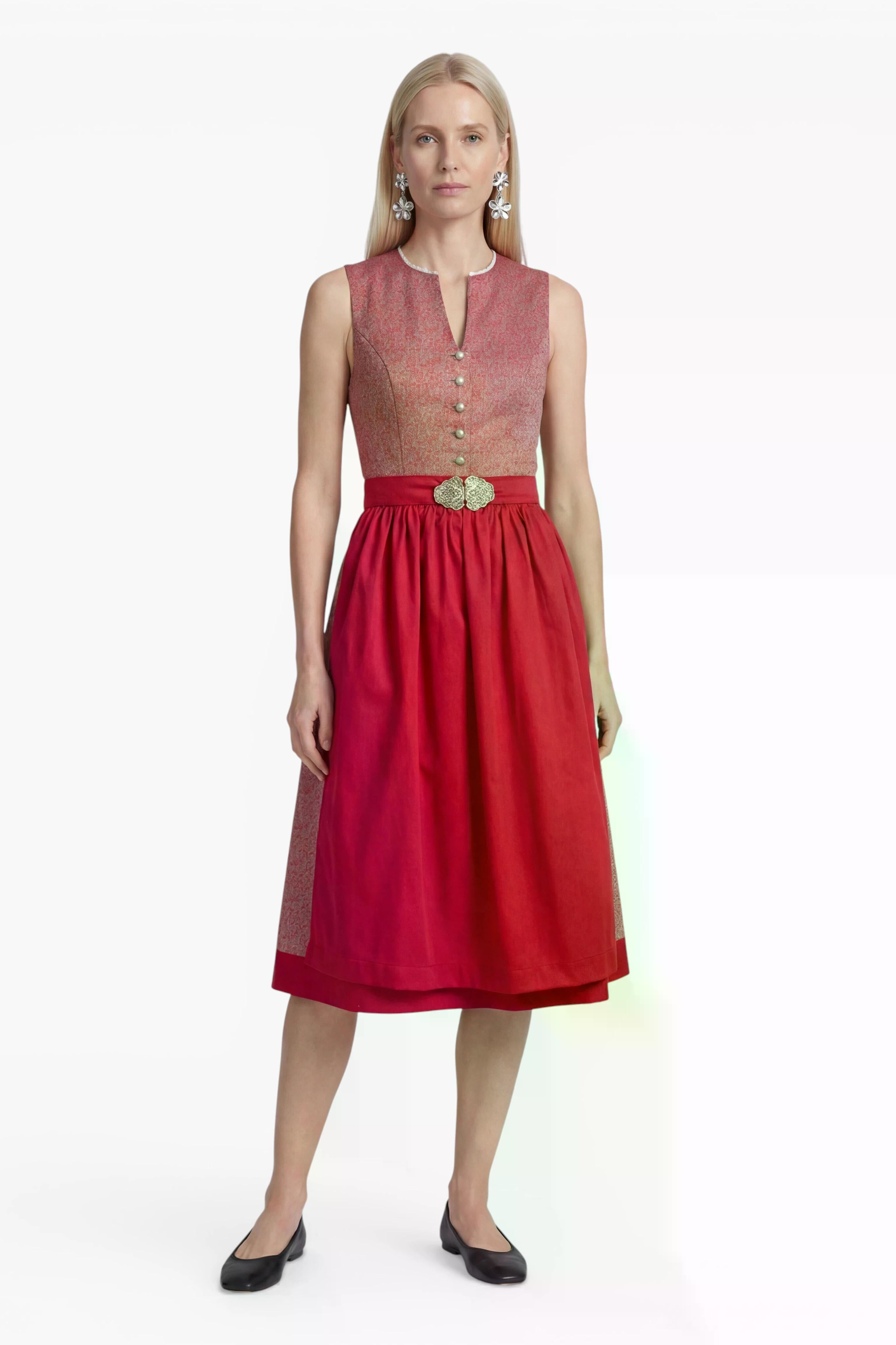 Model trägt Dirndl Sana mit roter Schürze, Vorderansicht