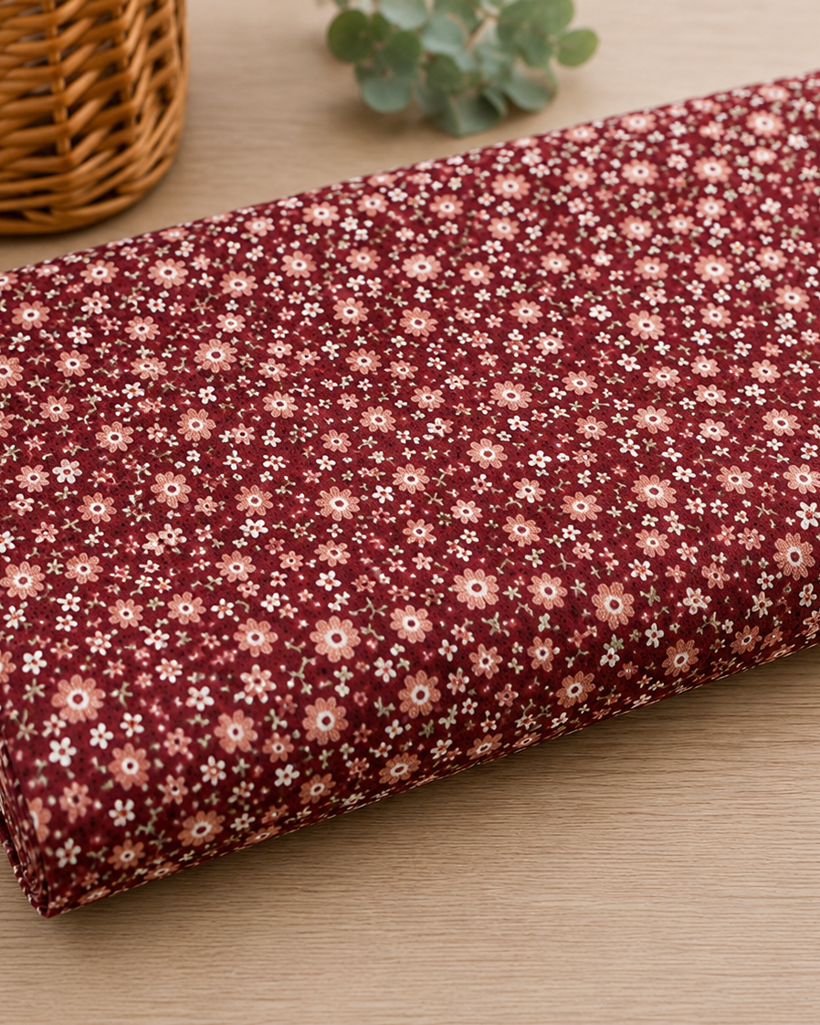 Baumwollstoff in Bordeaux mit kleinen Streublumen für Trachtenmode
