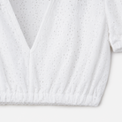 Detailaufnahme vom Saum der Dirndlbluse Lindsay