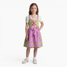 Mädchen trägt das Kinderdirndl Chrissi in Grün