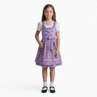 Mädchen trägt das Kinderdirndl Chrissi in Lila