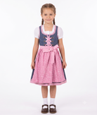 Mädchen trägt das Kinderdirndl Livia