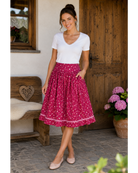 Trachtenrock Karin aus 100 % Baumwolle mit floralem Muster in rot, Rocklänge 65 cm.