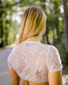 Dirndlbluse Eva Weiß aus elastischer Spitze mit kurzen Ärmeln